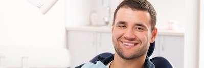 Man relaxing after getting Invisalign clear braces in Elk Grove village