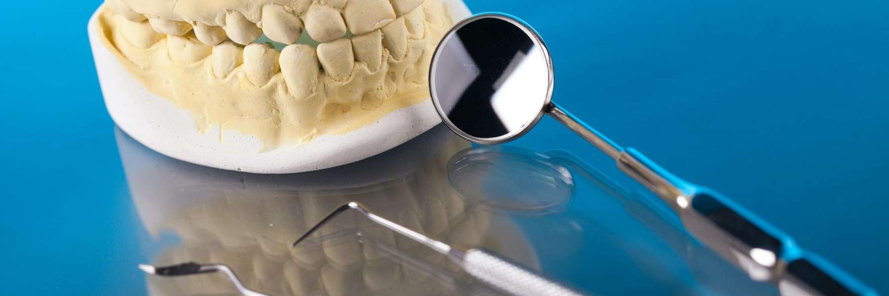 A dental impression and dental mirror in Elk Grove Village, IL