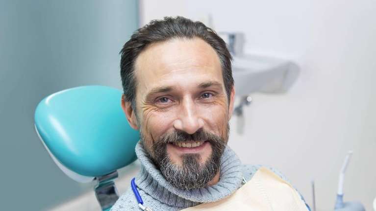 A middle aged man happy with BOTOX in Elk Grove Village, IL
