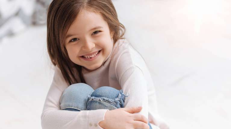 Kid smiling after dental check up at Elk Grove Smile Center
