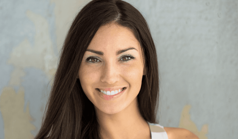 A woman after a cosmetic dentistry in Elk Grove Village, IL