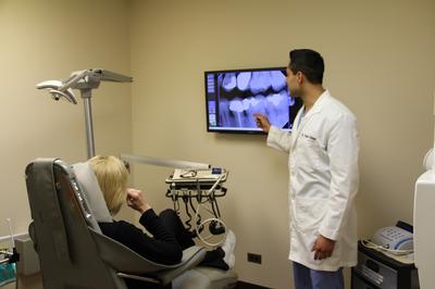 Dr. Vishal in exam room at Elk Grove Smile Center